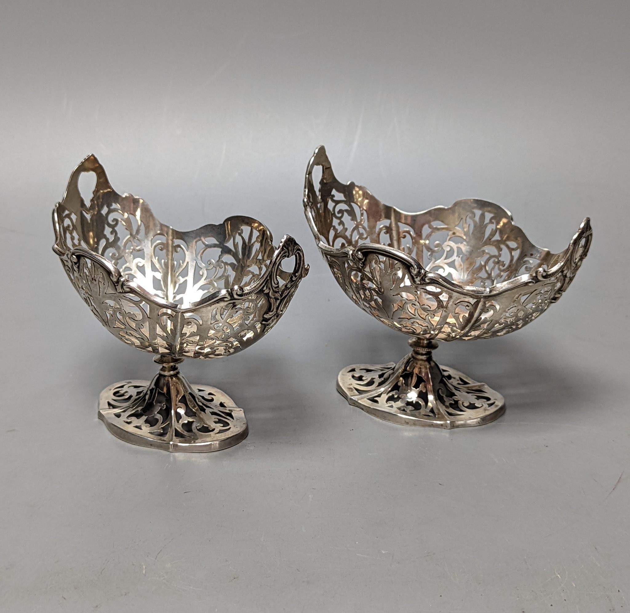 A pair of George V pierced silver boat shaped bonbon dishes, by Henry Matthews, Birmingham, 1920, length 12cm